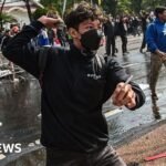 Tiga orang tewas setelah protes atas kematian sopir taksi di Indonesia